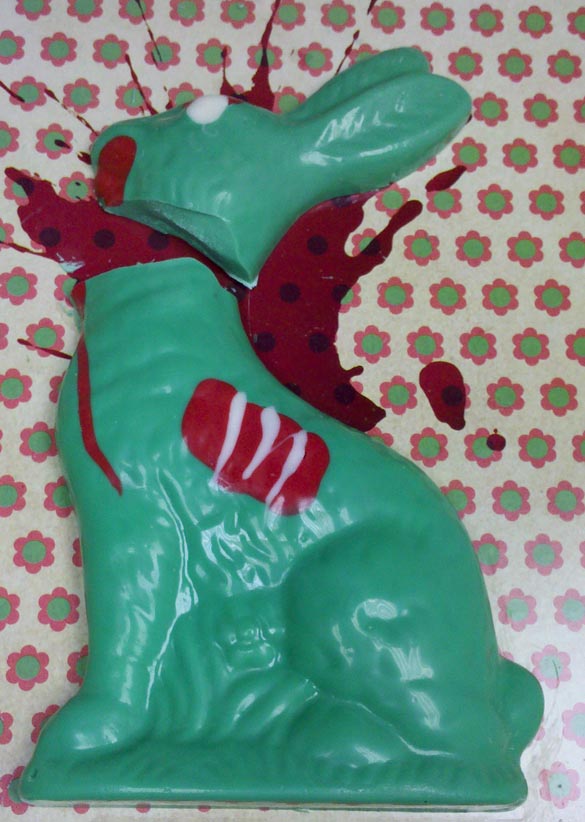 A zombie chocolate bunny with a severed head.