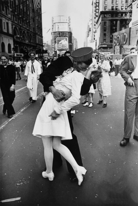 Alfred Eisenstaedt's V-J Day in Times Square picture from Life Magazine, featuring a sailor kissing a woman, while wearing a Reese's peanut butter cup hat.